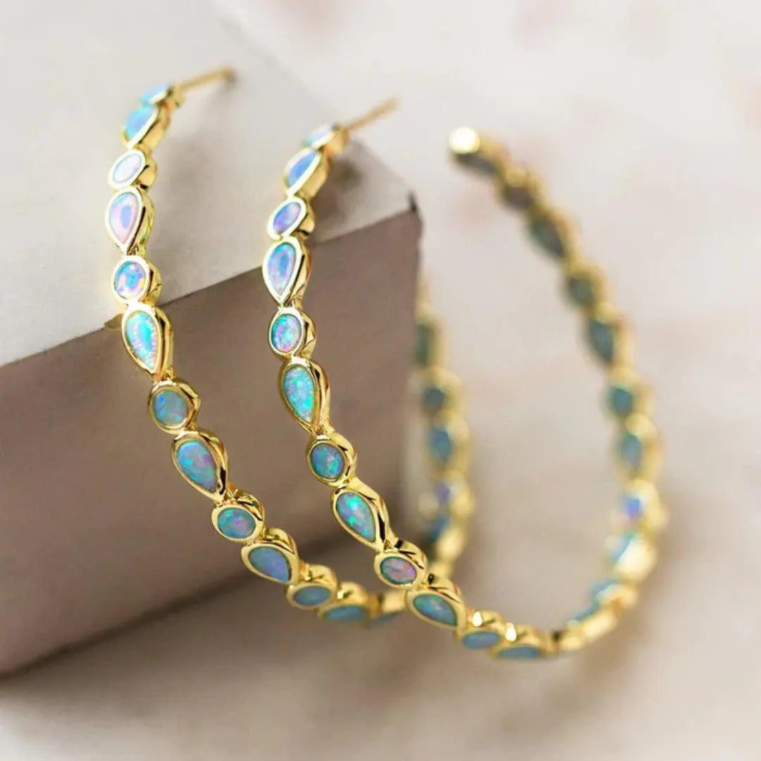 BOUCLES OPAL BLEUE RAFFINÉES EN OR
