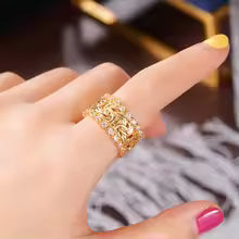BAGUE TRESSÉE DORÉE ZIRCONIA