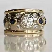 BAGUE RÉTRO OR INCRUSTÉE DE GEMME