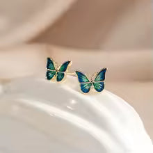 BOUCLES AILES PAPILLON ÉMAILLÉES BLEUES
