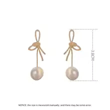 RADIANT RIBBON PEARL DROPS